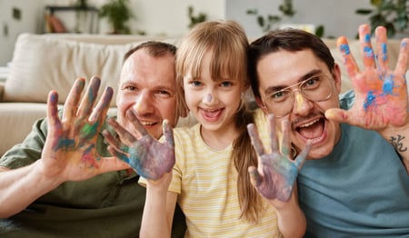 gay male couple with daughter